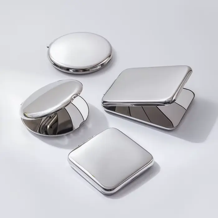 Petit miroir pliable double face