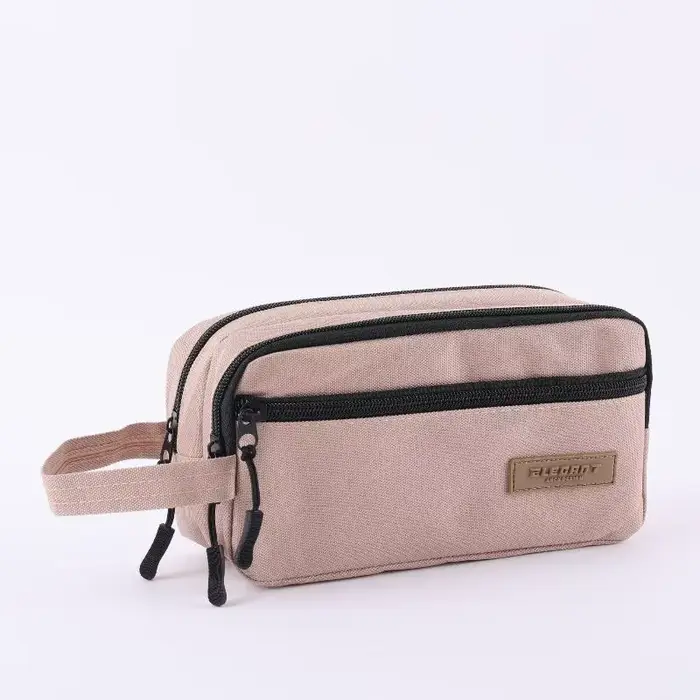 Trousse de toilette durable pour hommes et femmes avec design imperméable, idéale pour les voyages