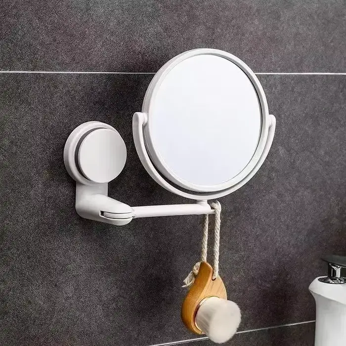 Miroir mural à bras pliant