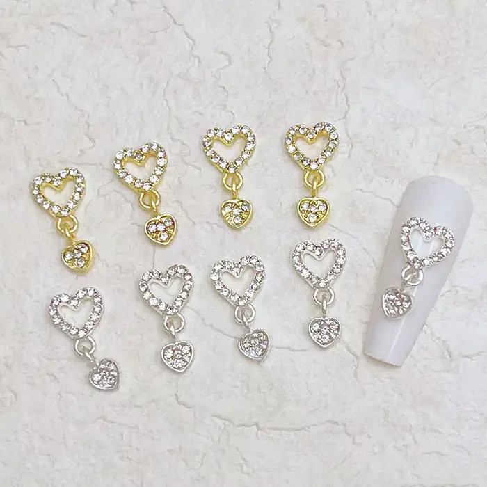 10 pièces coeur balancent ongles breloques 3D alliage luxe ongles strass argent or creux coeur ongle