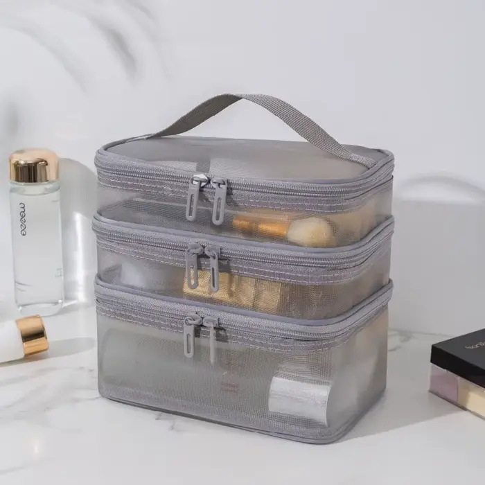 Trousse cosmétique de voyage en maille transparente pour femme