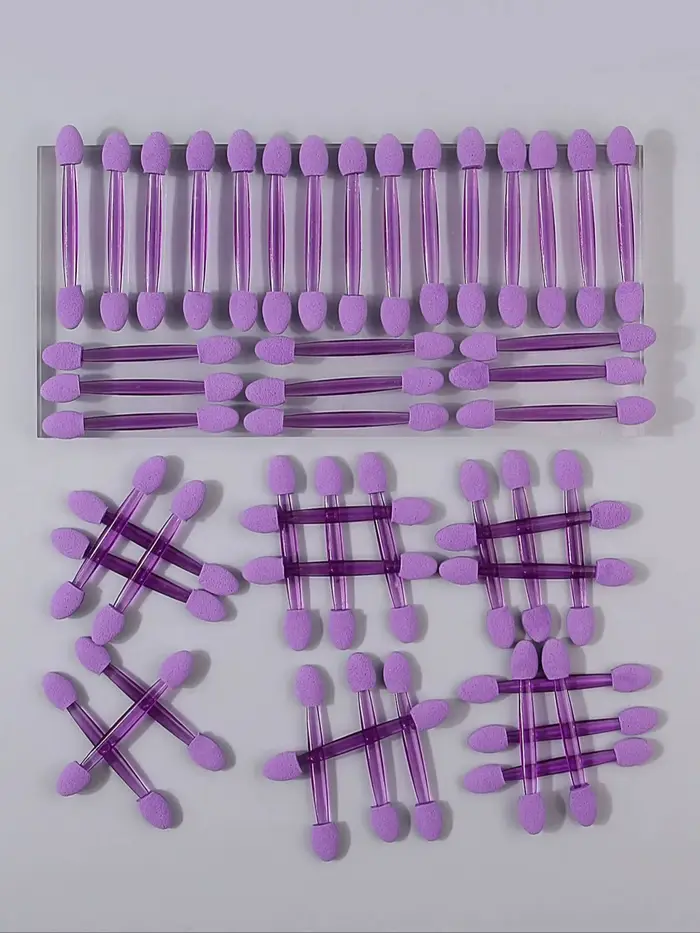 50 bâtonnets de fard à paupières en éponge double tête violettes. Les bâtonnets éponge sont des esto
